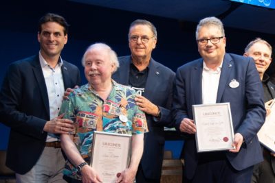 Michael Kreft von Byern (r.) und Chip Cleary (l.) zusammen mit Roland und Thomas Mack bei der Eröffnung von Rulantica 2019